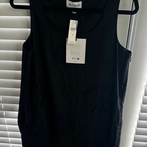 NWT. Aligne belle broderie mini black dress with pockets size 8.